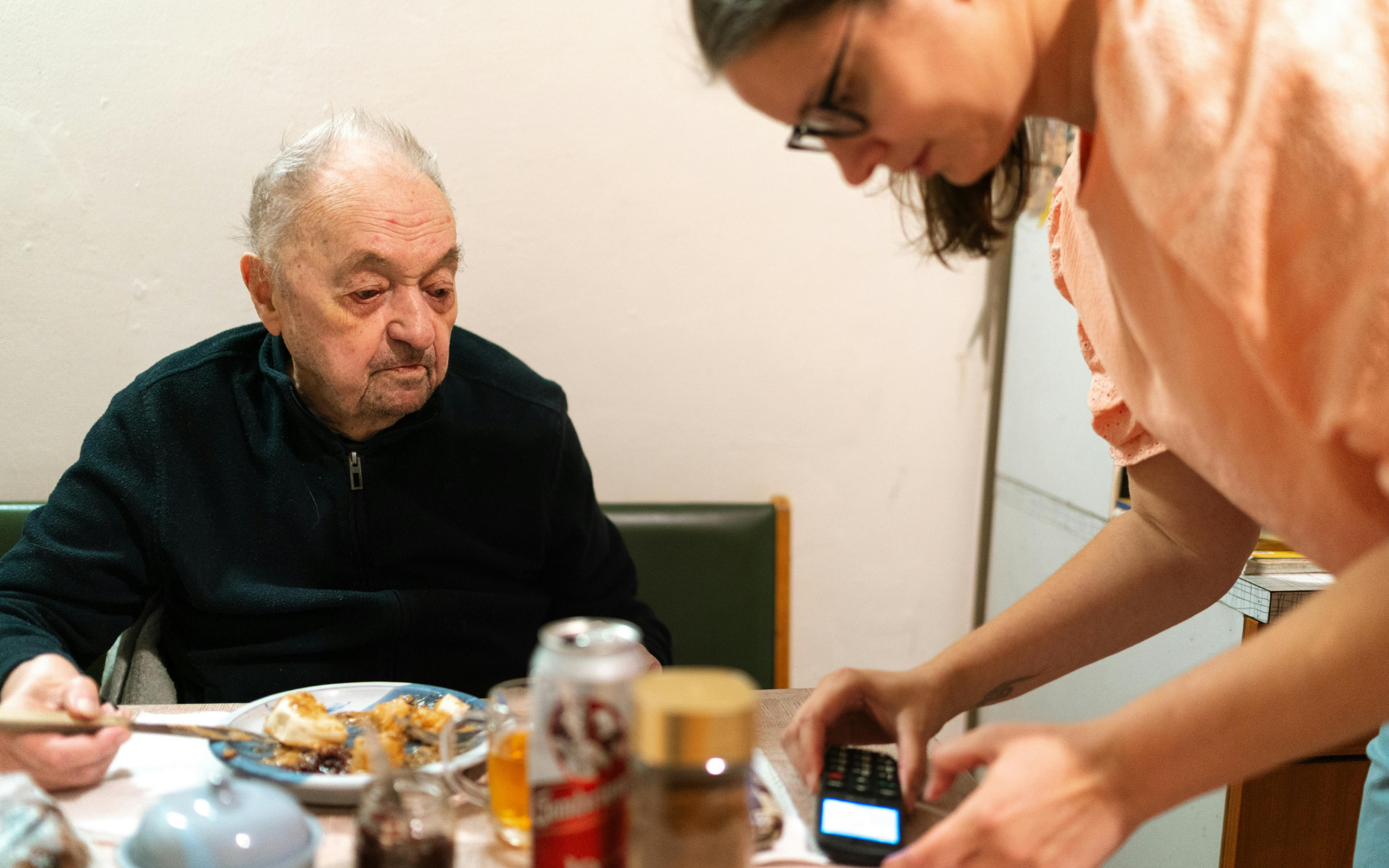 Caregiver supporting a senior re-establishing daily routines after hospital discharge in Ontario